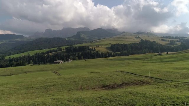 Aerial Drone video of the Sassolungo mountains on the Italian Alps Dolomites