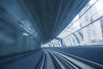 Motion blur of train moving inside tunnel - Powered by Adobe
