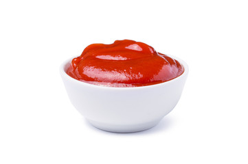 Red tasty ketchup or tomato sauce in bowl isolated on white background - obrazy, fototapety, plakaty