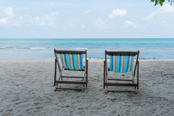 Colorful wooden beach chairs