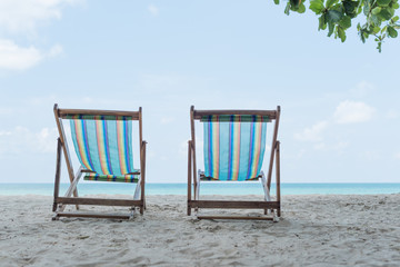 Colorful wooden beach chairs