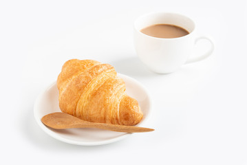 Coffee and croissant on white background