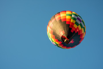 Hot Air Balloon Flying Up Into the Clear Blue Sky at the Balloon & Kite Festival in Grants Pass, Oregon