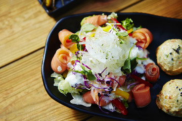 Fish cake ball with salmon salad 