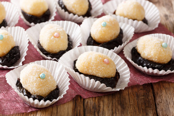 Authentic Brazilian sweet candies Olho de sogra with dried plums close-up. horizontal