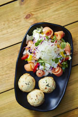 Fish cake ball with salmon salad 