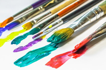 Obraz premium DIFFERENT ARTISTIC BRUSHES ON THE WHITE BACKGROUND,