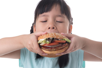 portrait of a beautiful girl, teenager and schoolgirl, holding a hamburger on a white background