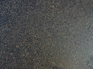 Smooth asphalt road. The texture of the tarmac, top view.