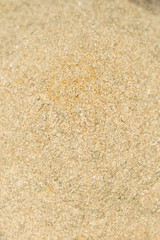 Brown background of ground pepper. macro.