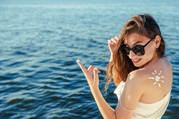 Portrait woman on  sea background. 