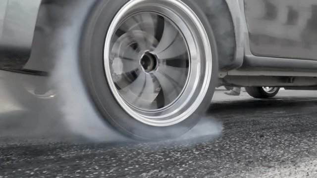 Slow motion, Drag racing car burn tire at start line