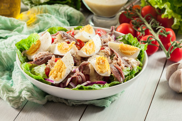 Nicoise Salad with tuna, anchovy, eggs and tomatoes