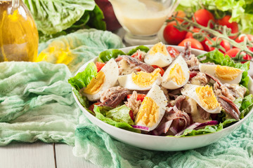Nicoise Salad with tuna, anchovy, eggs and tomatoes