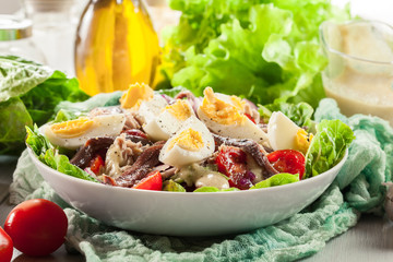 Nicoise Salad with tuna, anchovy, eggs and tomatoes