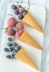 Frozen berries in waffle cones