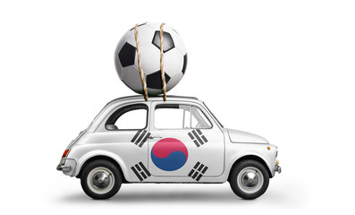 Korea flag on car delivering soccer or football ball isolated on white background