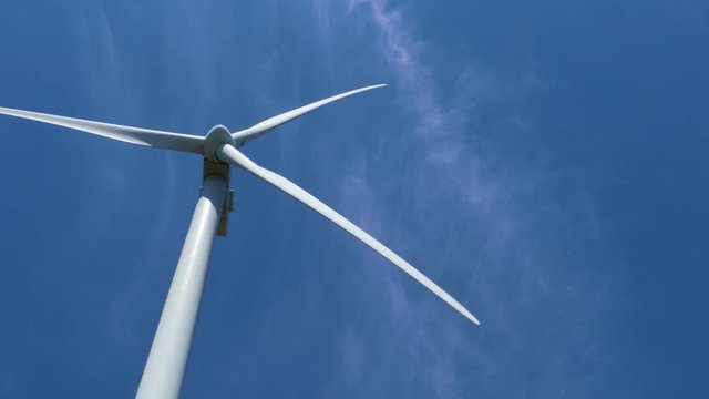 The wind turbine is spinning and generating electricity