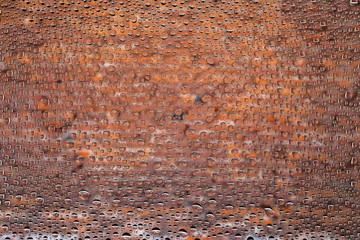 Close up of a water drops on a red old brick background, covered with drops of water -condensation.