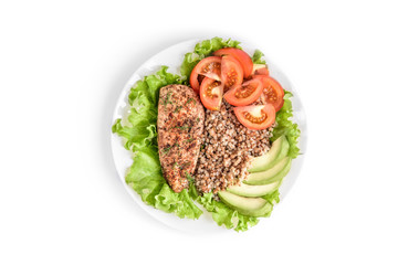 Grilled chicken breast with buckwheat porridge, tomatoes and avocado isolated on white background.