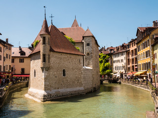 Fototapeta na wymiar Cityscape with ancient prison now museum in Old Town of Annecy. France