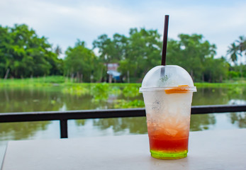 Italian soda cold on the table, white in a restaurant on the raft.