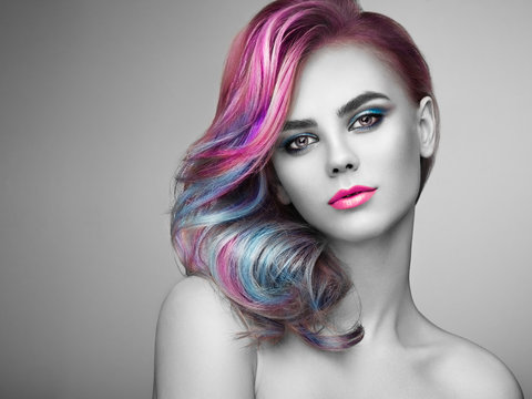 Beauty Fashion Model Girl with Colorful Dyed Hair. Girl with perfect Makeup and Hairstyle. Model with perfect Healthy Dyed Hair. Rainbow Hairstylesr