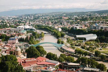 Obraz premium Panoramic view of Tbilisi city from the Narikala Fortress, old town and modern architecture. Tbilisi the capital of Georgia.