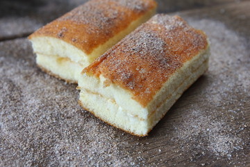 fresh sweet homemade delicious cake on wooden background