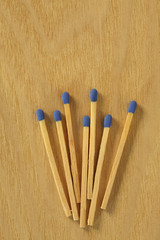 some matches on a wooden table