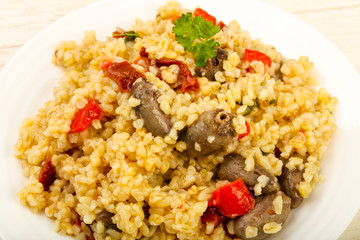 Bulgur with chicken hearts