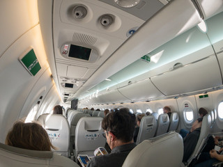 Passengers at the economy class at airplane