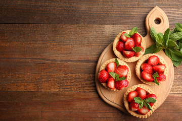 Ripe strawberries in tartlets