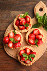 Ripe strawberries in tartlets
