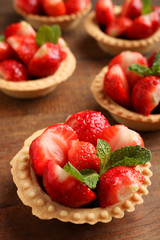 Ripe strawberries in tartlets