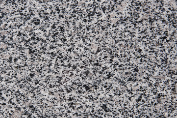 Flecked stone texture in gray and black colors