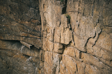 full frame image of rocky cliff surface background