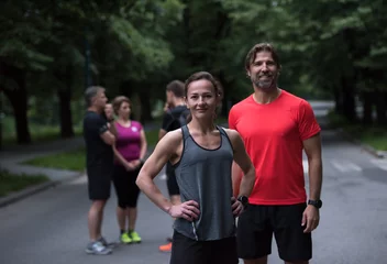 Papier Peint photo autocollant Jogging portrait of a healthy jogging couple