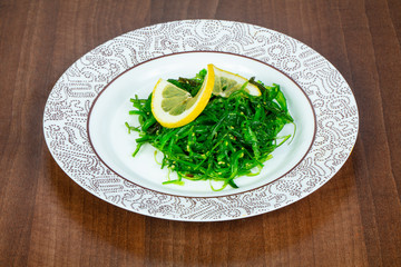 Chuka salad served lemon