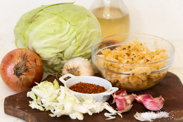 handmade preparation of sauerkraut and cabbage kimchi