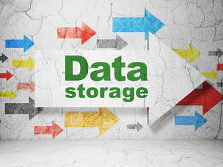 Information concept:  arrow with Data Storage on grunge textured concrete wall background, 3D rendering