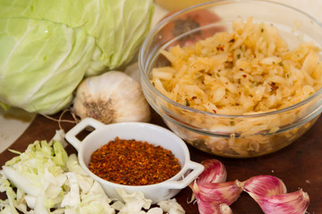 handmade preparation of sauerkraut and cabbage kimchi