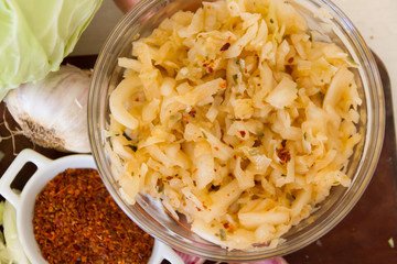 handmade preparation of sauerkraut and cabbage kimchi