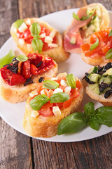 assorted bruschetta with ingredients