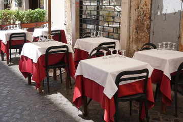 Street restaurant with tables set