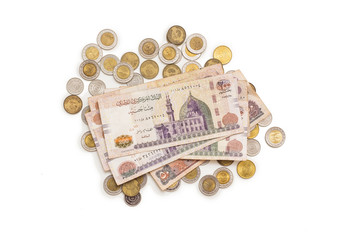 Banknotes in and Coins, Saving Concept, Egyptian Money, Isolated on White Background