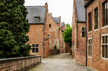 Deurstickers View on belgian brick house in Groot Begijnhof Leuven © katspi