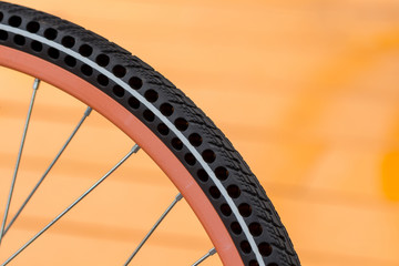 Obraz premium details of bicycle wheel in park, close up of flat-free or airless bike tire