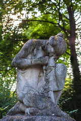 Statue of a Mourning Woman on a Graveyard