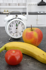 clock with apple banana tomato